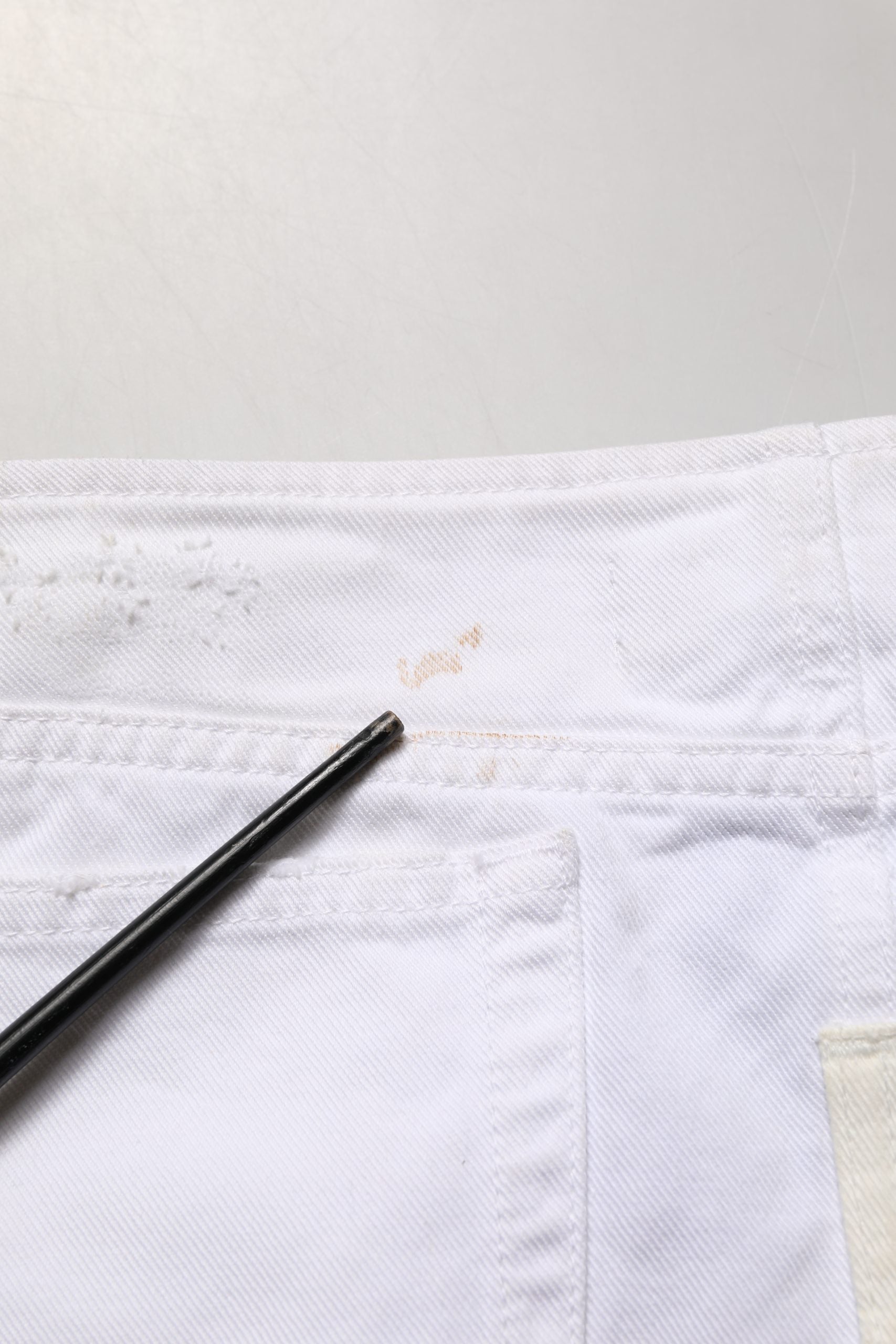 White Distressed Cotton Denim Mini Skirt
